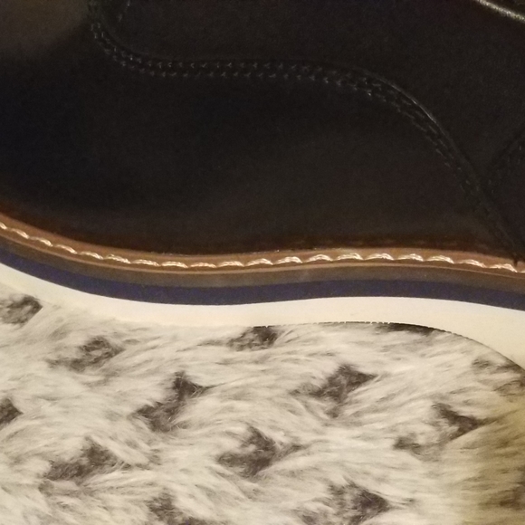 Black lace up Leather shoes with a rubber sole